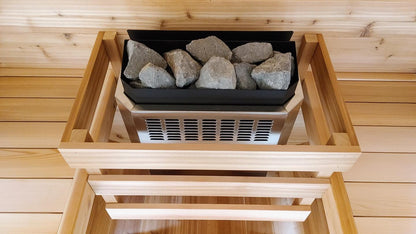 Homecraft H-Series electric sauna heater top view installed in cedar safety cage