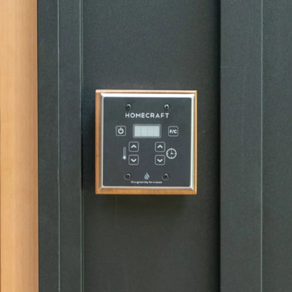 Homecraft sauna heater controller close-up mounted on black sauna wall